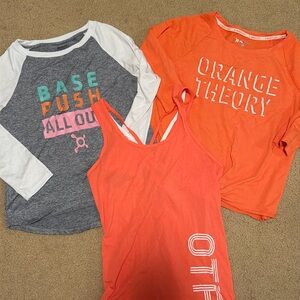 Three OrangeTheory shirts - sizes XS/S